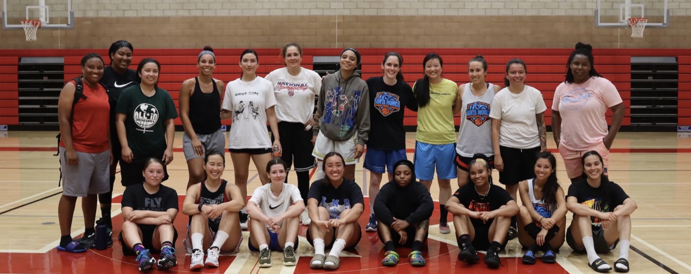 Women’s Open Gym players together on the basketball court