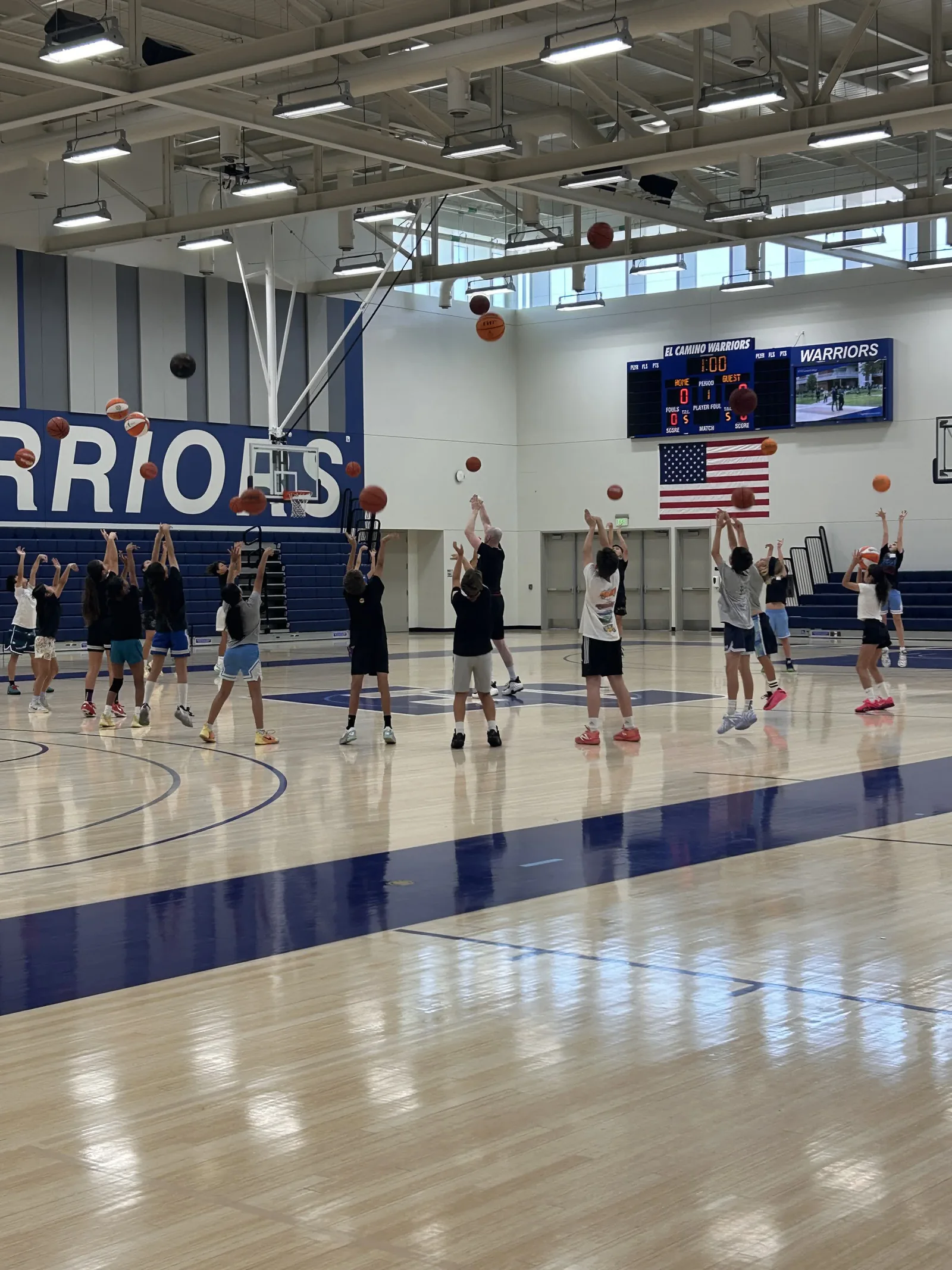 Youth players practicing shots together at El Camino College